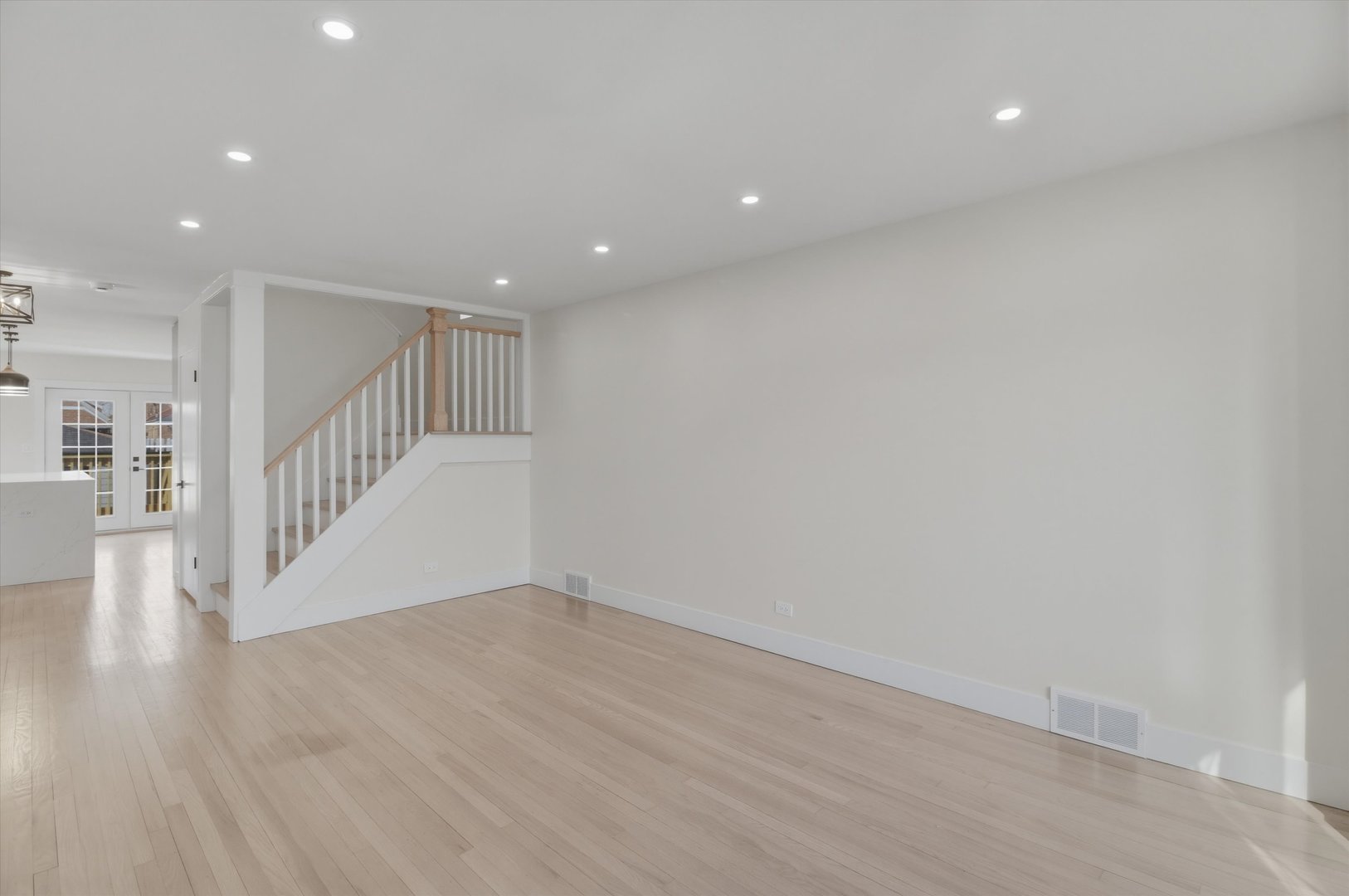 7230 South Avers Avenue Chicago, IL 60629 - Photo 6 of 44 a view of an empty room with wooden floor