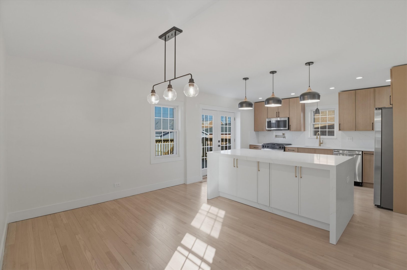 7230 South Avers Avenue Chicago, IL 60629 - Photo 9 of 44 a large white kitchen with cabinets
