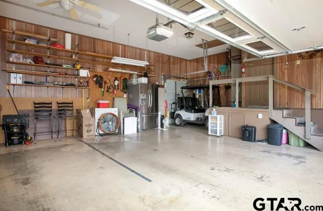 a view of a garage with storage