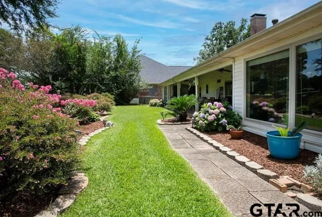 a view of a garden with a flower garden
