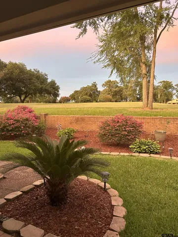 a view of a lake with an outdoor space