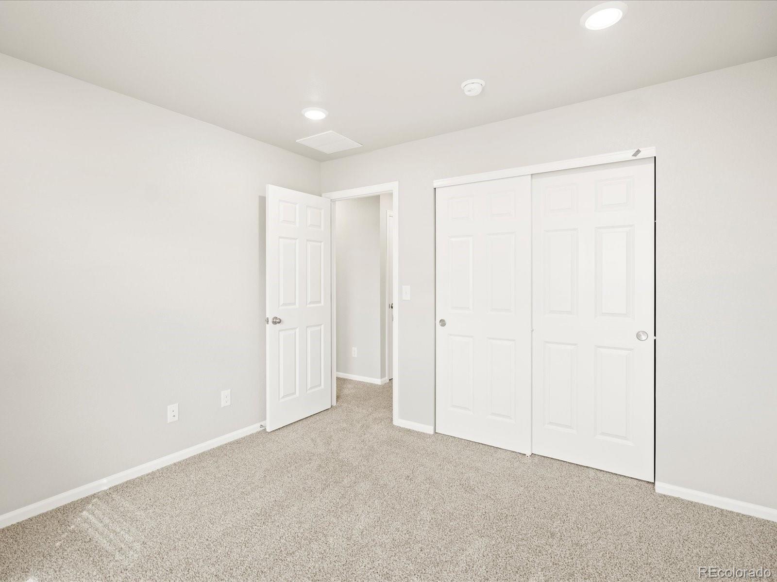 17517 East 89th Way Commerce City, CO 80022 - Photo 17 of 31 a view of an empty room