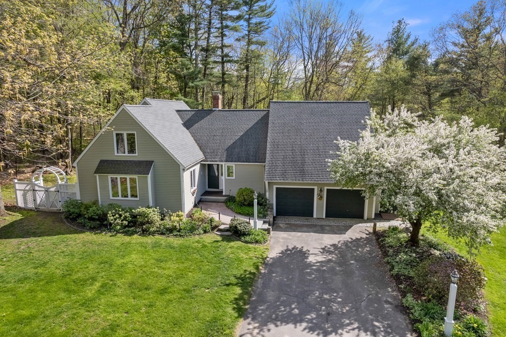 24 Parmenter Road Framingham, MA 01701 - Photo 1 of 42 a view of a house with backyard and garden