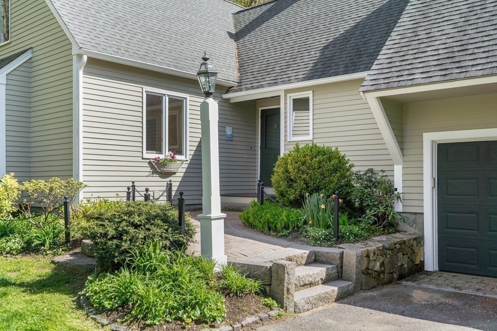 24 Parmenter Road Framingham, MA 01701 - Photo 3 of 42 a front view of a house with plants