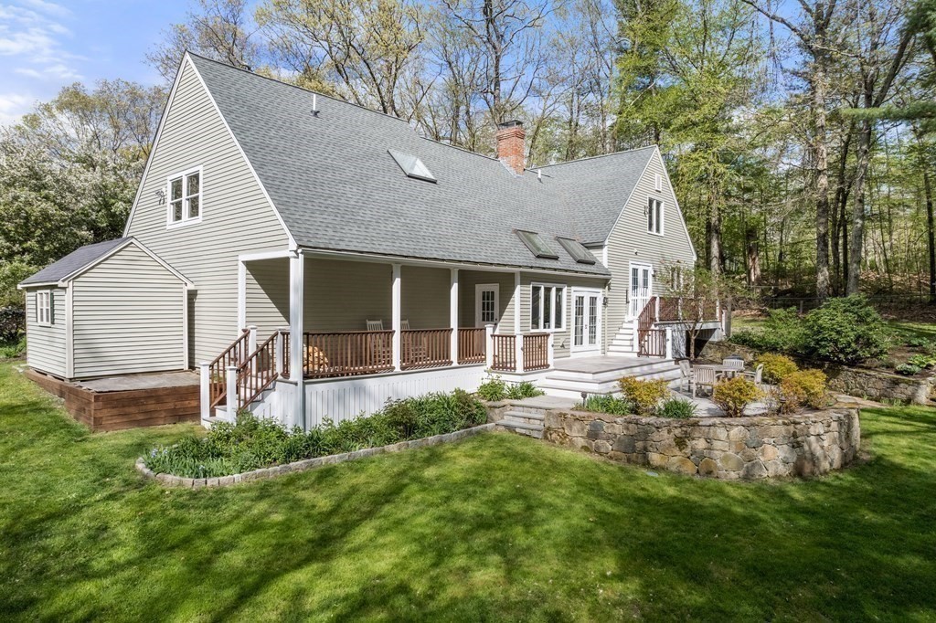 24 Parmenter Road Framingham, MA 01701 - Photo 4 of 42 a front view of house with yard and green space