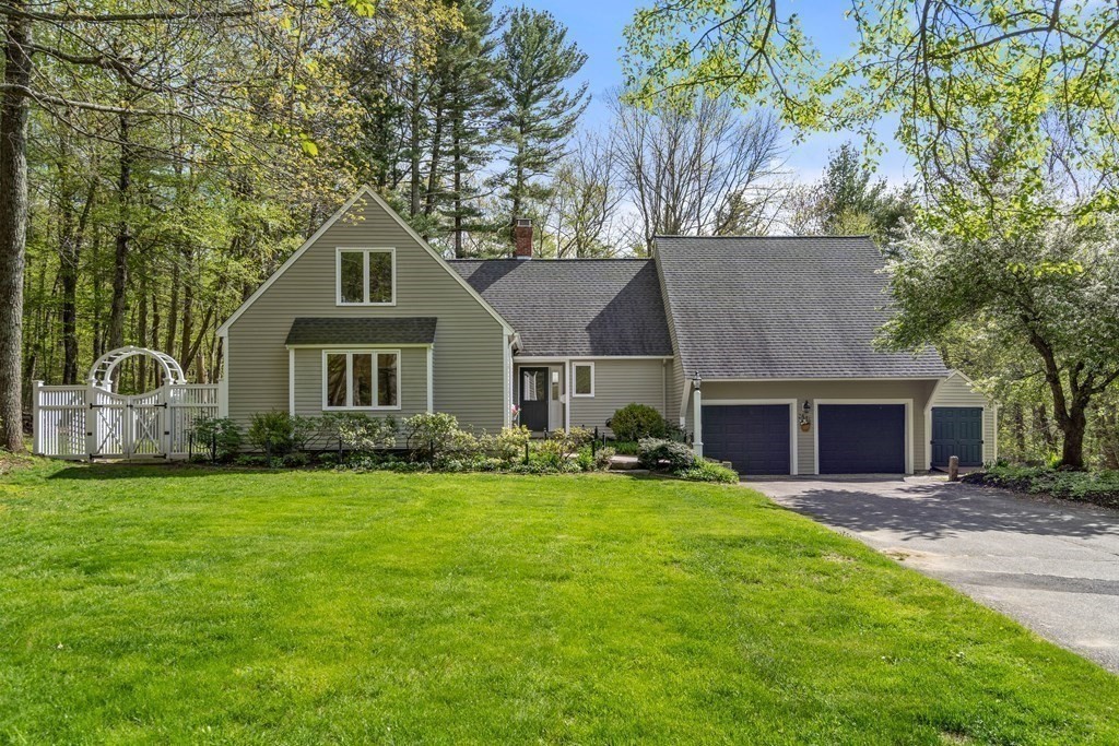 24 Parmenter Road Framingham, MA 01701 - Photo 42 of 42 a front view of a house with yard and green space