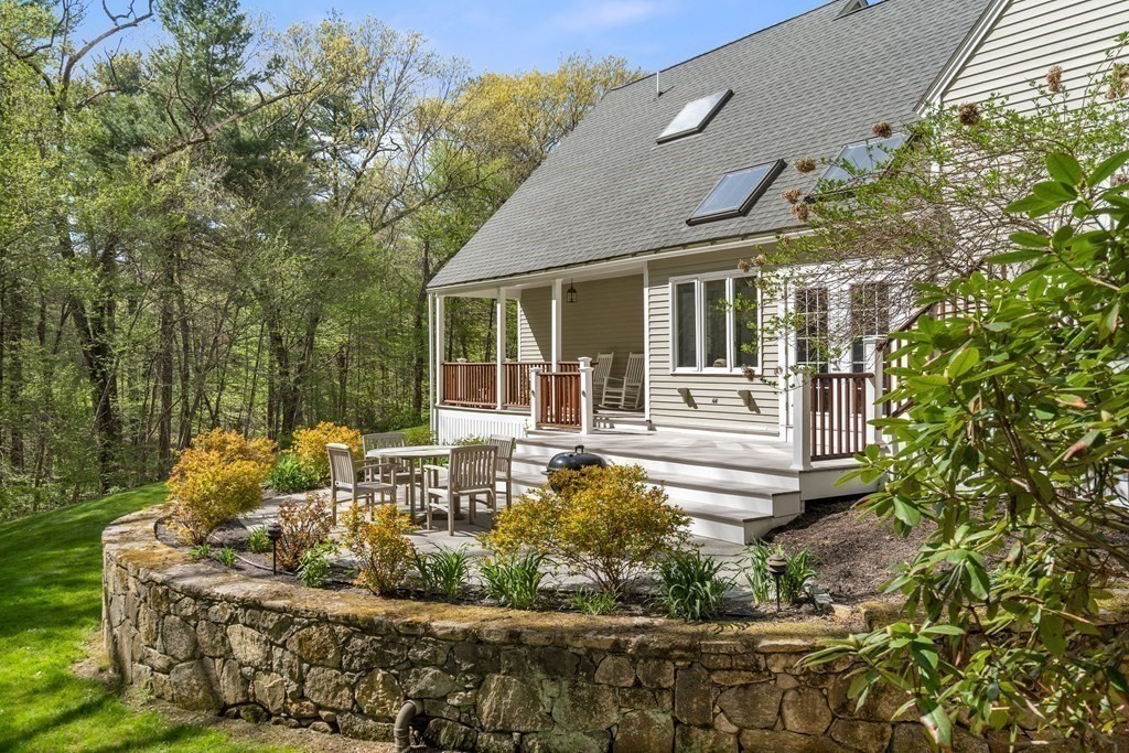 24 Parmenter Road Framingham, MA 01701 - Photo 6 of 42 a view of house with backyard outdoor seating and green space