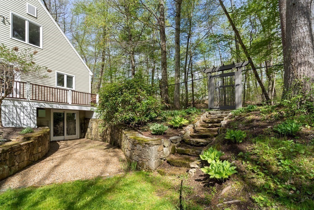 24 Parmenter Road Framingham, MA 01701 - Photo 10 of 42 a view of a yard with plants and large trees