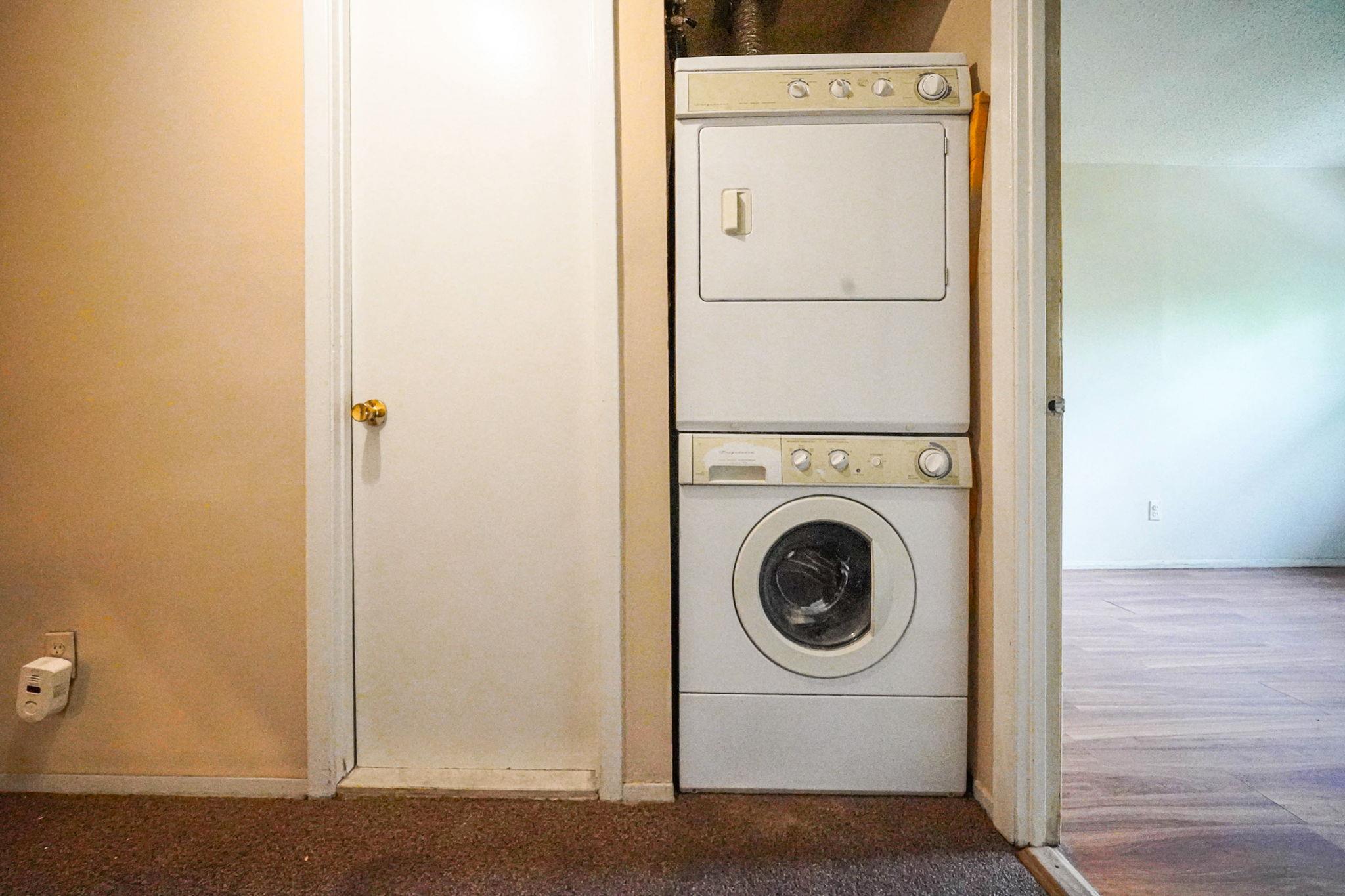 504 Julius Road, Unit 7C Queens, NY 11356 - Photo 16 of 22 a utility room with dryer and washer