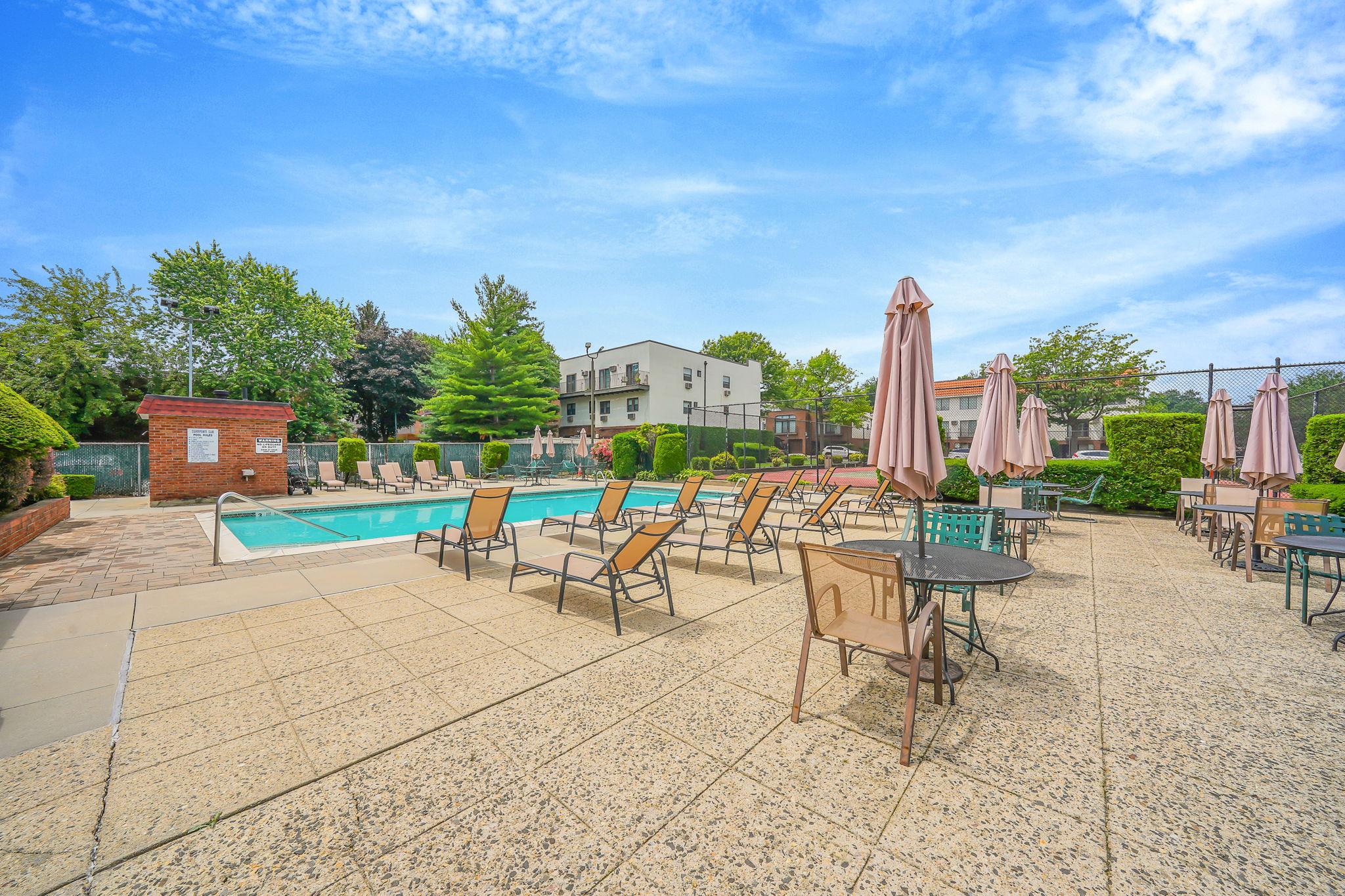 504 Julius Road, Unit 7C Queens, NY 11356 - Photo 19 of 22 a view of a terrace with sitting area