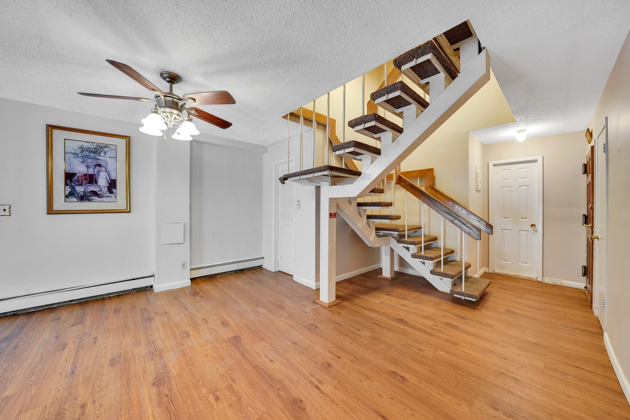 504 Julius Road, Unit 7C Queens, NY 11356 - Photo 10 of 22 a view of an entryway with wooden floor