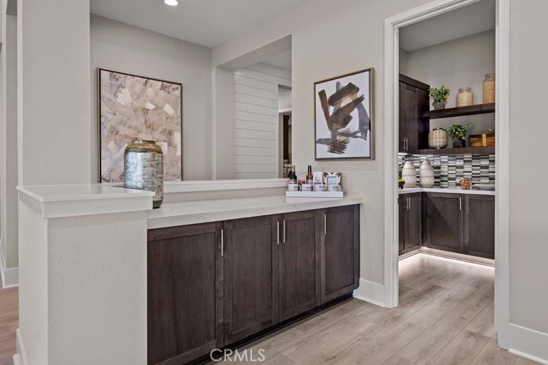 6505 Canyon Oaks Drive Simi Valley, CA 93063 - Photo 12 of 22 a bathroom with a double vanity sink and a mirror