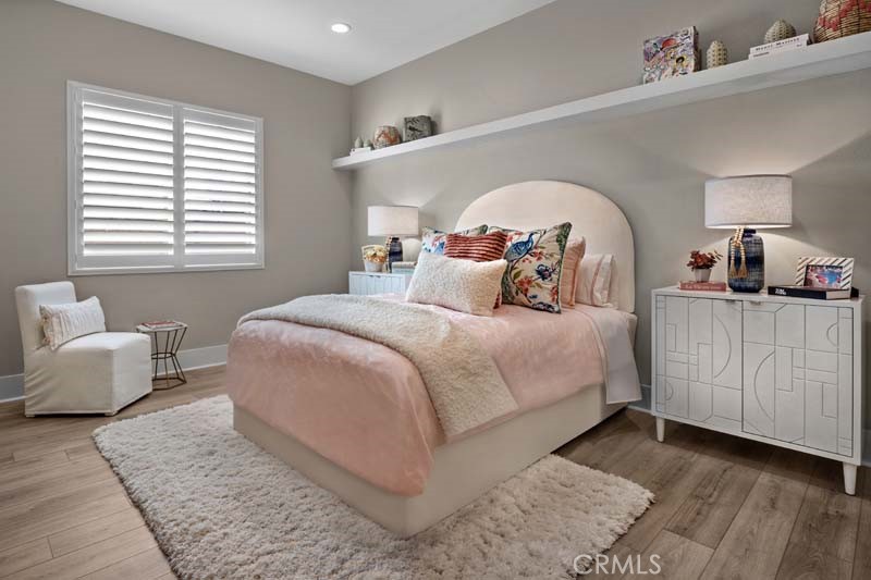 6505 Canyon Oaks Drive Simi Valley, CA 93063 - Photo 14 of 22 a bedroom with a large bed and a couch