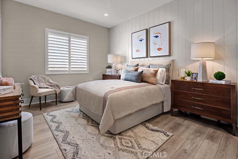 6505 Canyon Oaks Drive Simi Valley, CA 93063 - Photo 16 of 22 a bedroom with a bed and a lamp on dresser