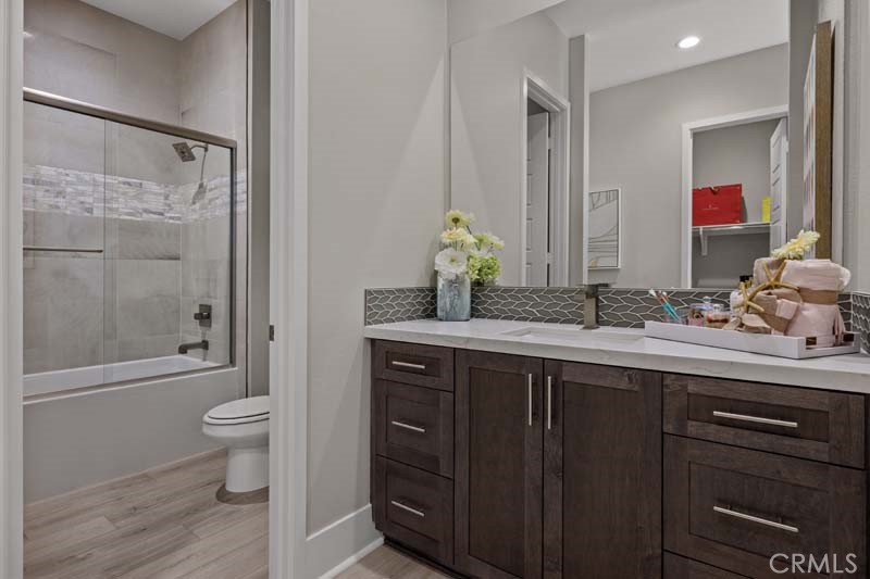 6505 Canyon Oaks Drive Simi Valley, CA 93063 - Photo 19 of 22 a bathroom with a granite countertop sink toilet and shower
