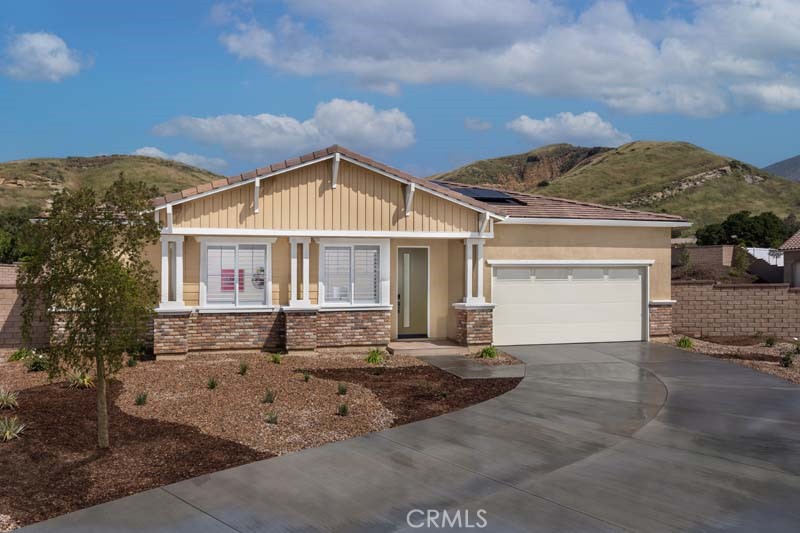 6505 Canyon Oaks Drive Simi Valley, CA 93063 - Photo 21 of 22 front view of a house with a yard