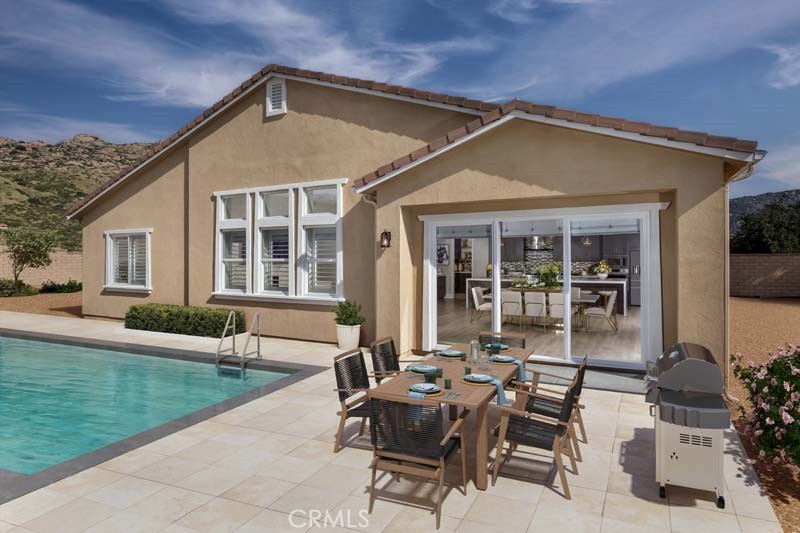 6505 Canyon Oaks Drive Simi Valley, CA 93063 - Photo 22 of 22 a view of a house with backyard porch and sitting area