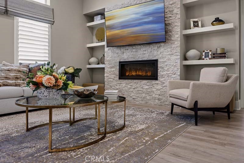 6505 Canyon Oaks Drive Simi Valley, CA 93063 - Photo 6 of 22 a living room with furniture and a fireplace
