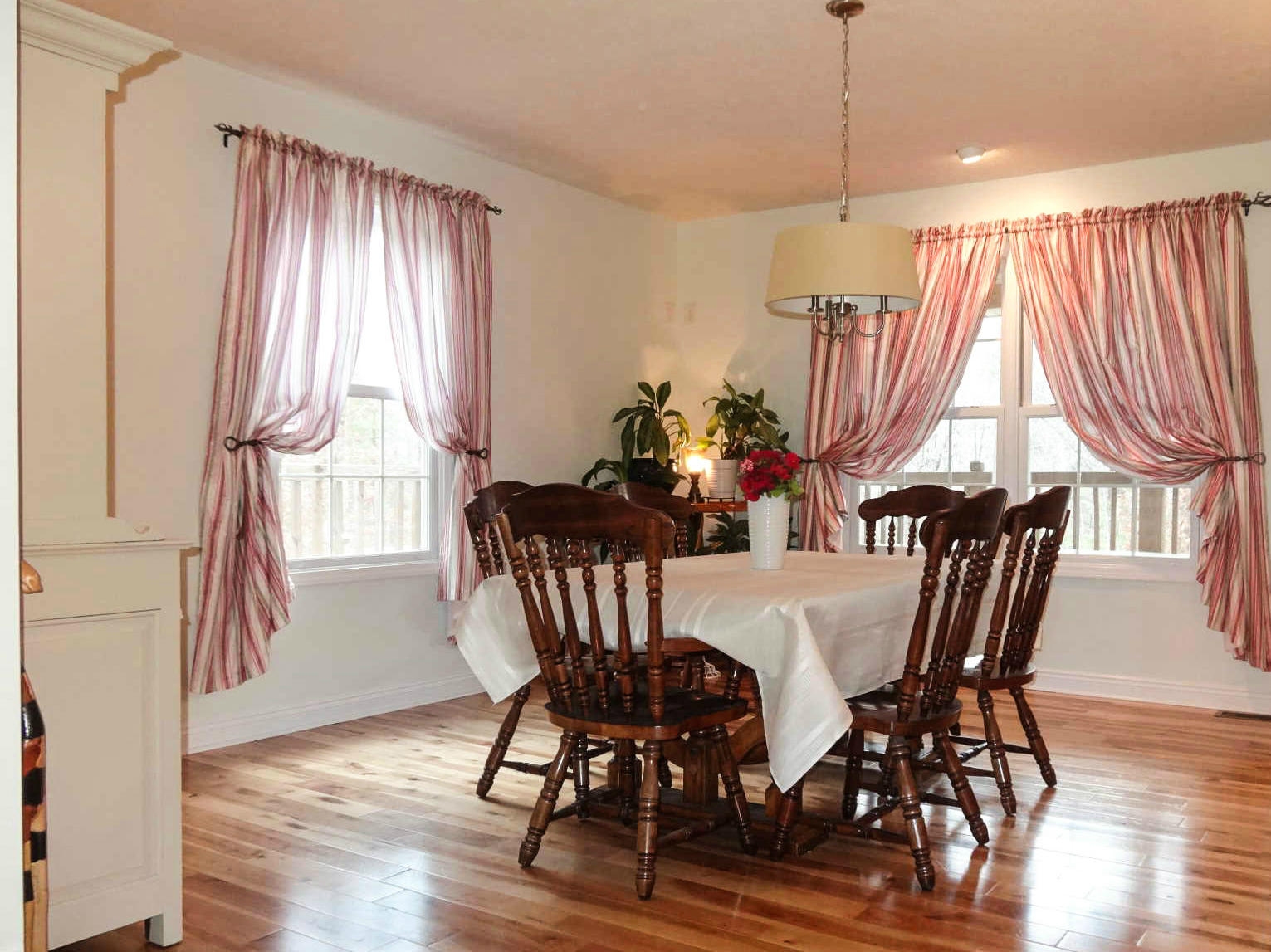749 Isolane Road Callaway, VA 24067 - Photo 11 of 38 a view of a dining room with furniture window and wooden floor