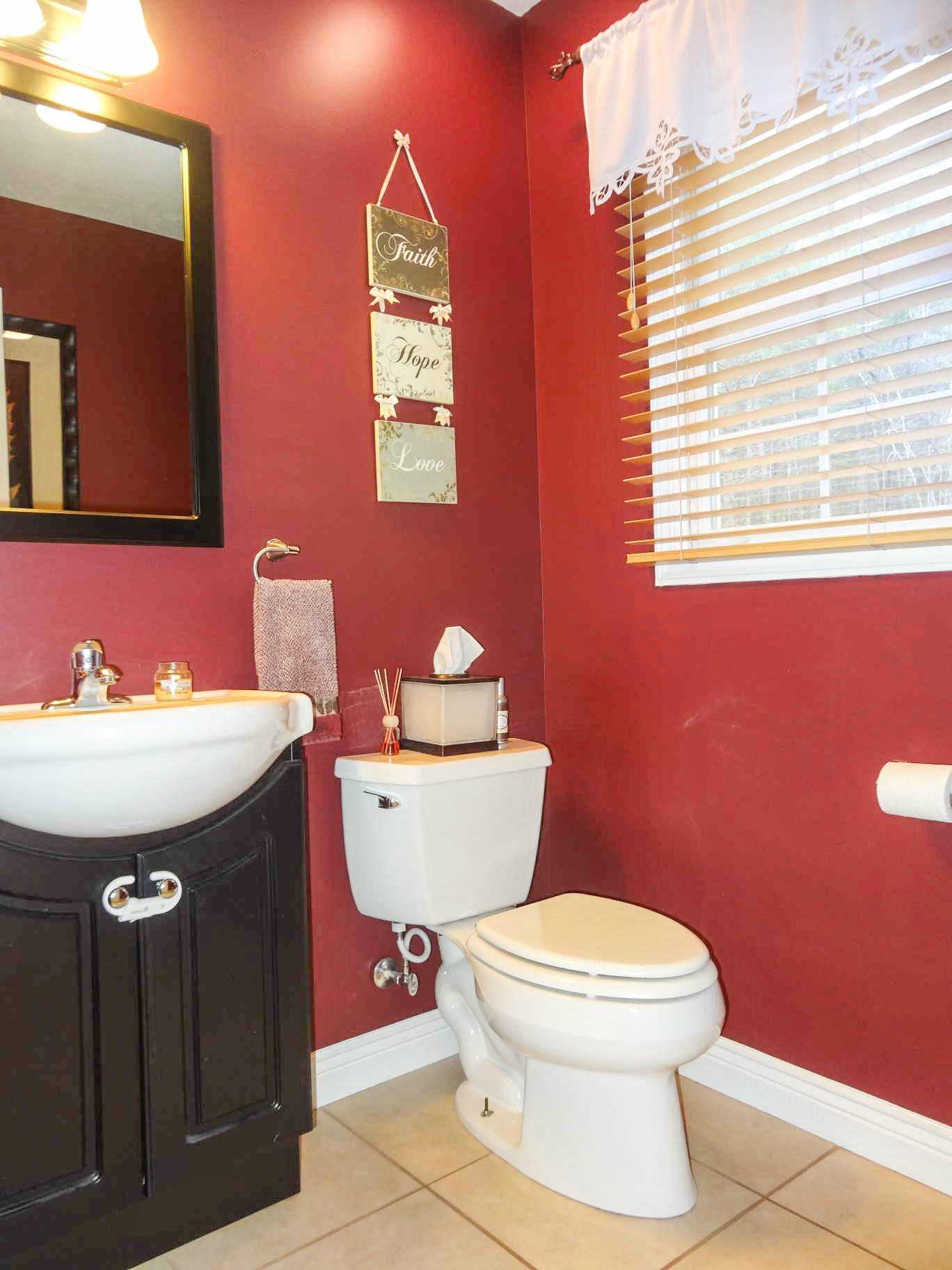 749 Isolane Road Callaway, VA 24067 - Photo 12 of 38 a bathroom with a granite countertop toilet a sink and a mirror