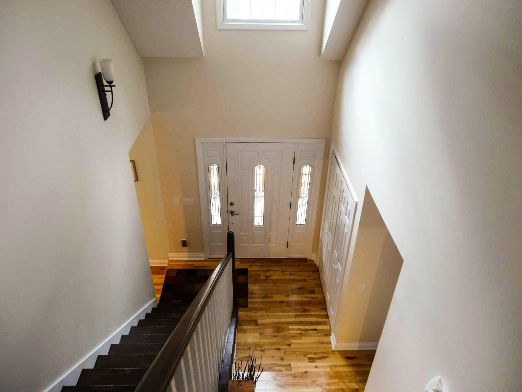 749 Isolane Road Callaway, VA 24067 - Photo 17 of 38 a view of a hallway with wooden floor and staircase