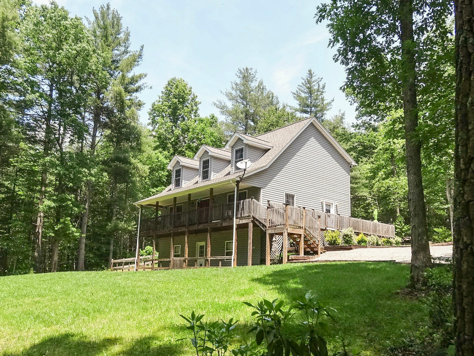 749 Isolane Road Callaway, VA 24067 - Photo 3 of 38 a view of a house with a yard and sitting area