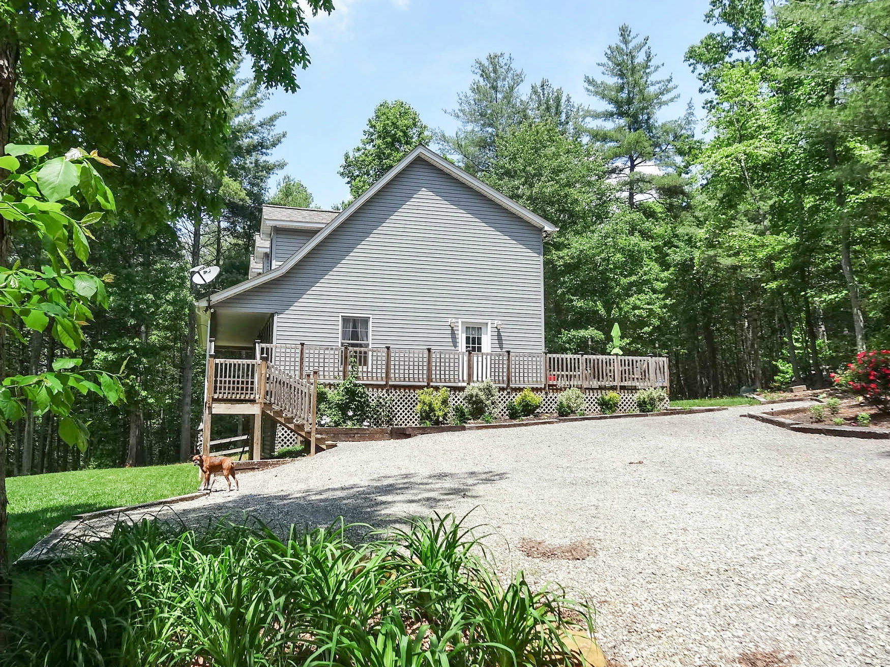 749 Isolane Road Callaway, VA 24067 - Photo 4 of 38 a view of a house with backyard and a garden