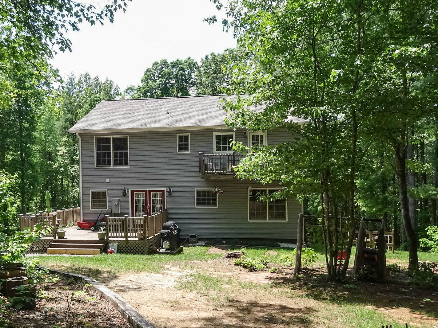 749 Isolane Road Callaway, VA 24067 - Photo 31 of 38 a view of a house with backyard porch and sitting area