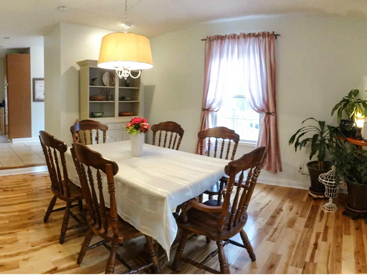 749 Isolane Road Callaway, VA 24067 - Photo 10 of 38 a view of a dining room with furniture and wooden floor