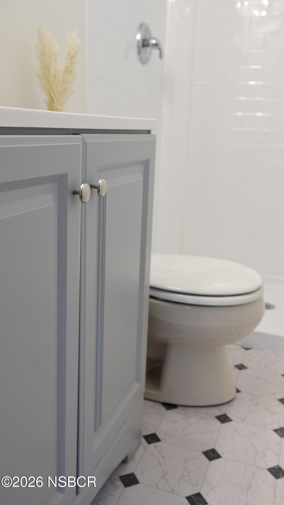 1312 North First Place Lompoc, CA 93436 - Photo 29 of 38 a bathroom with a toilet and a shower