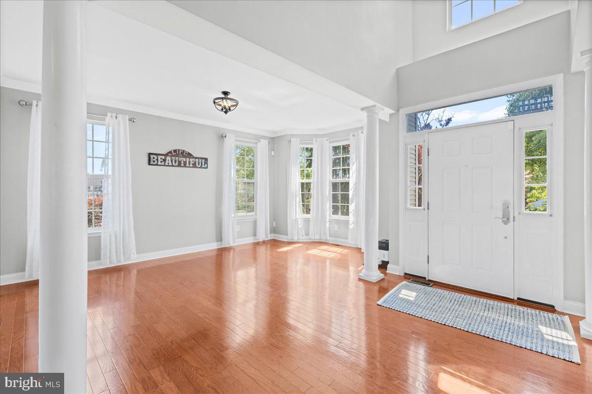 2650 Valhalla Road Vineland, NJ 08361 - Photo 6 of 49 a view of an empty room with window and wooden floor