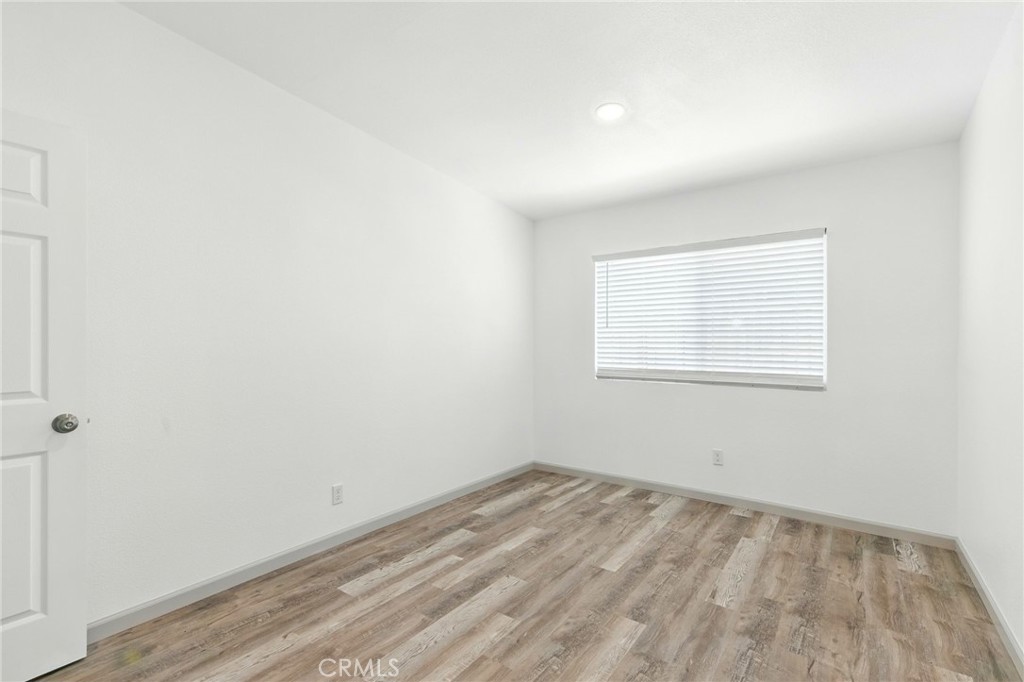 38833 9th Street East Palmdale, CA 93550 - Photo 12 of 28 an empty room with a window