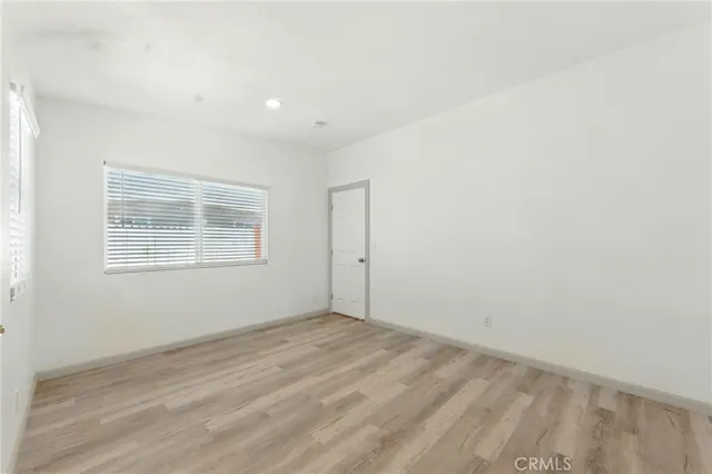 a view of empty room with windows