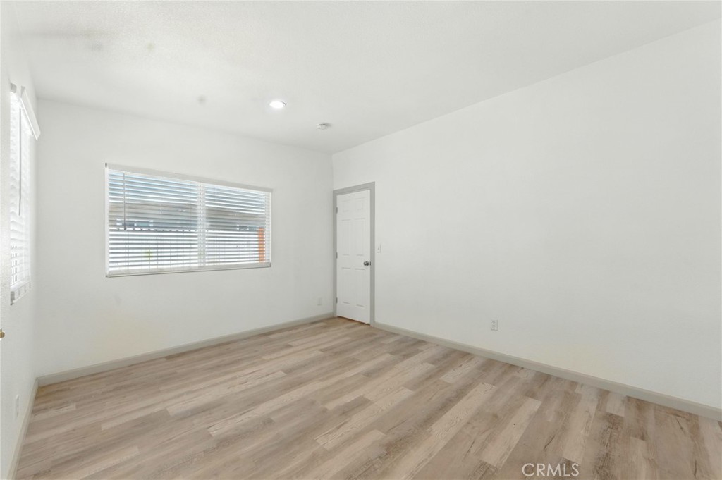 38833 9th Street East Palmdale, CA 93550 - Photo 13 of 28 a view of empty room with windows