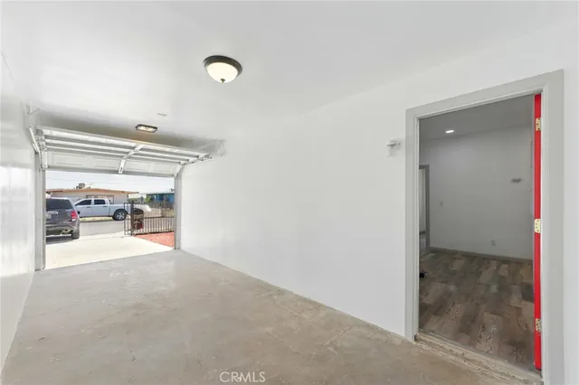 a view of a livingroom and kitchen view