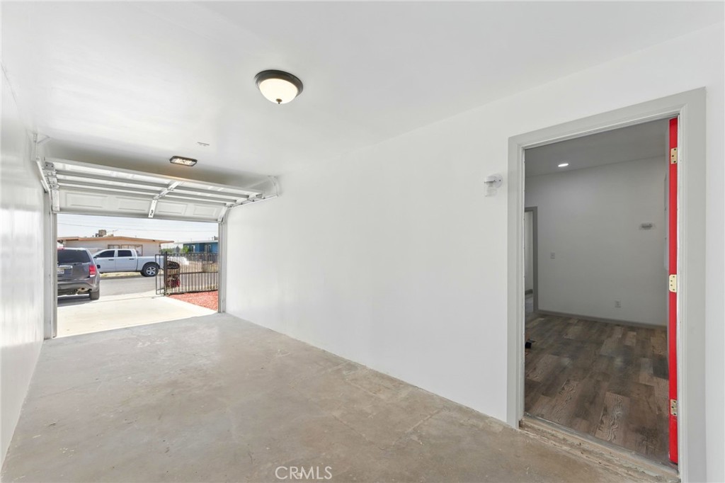 38833 9th Street East Palmdale, CA 93550 - Photo 23 of 28 a view of a livingroom and kitchen view