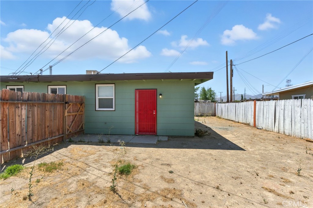 38833 9th Street East Palmdale, CA 93550 - Photo 28 of 28 a front view of a house with a yard