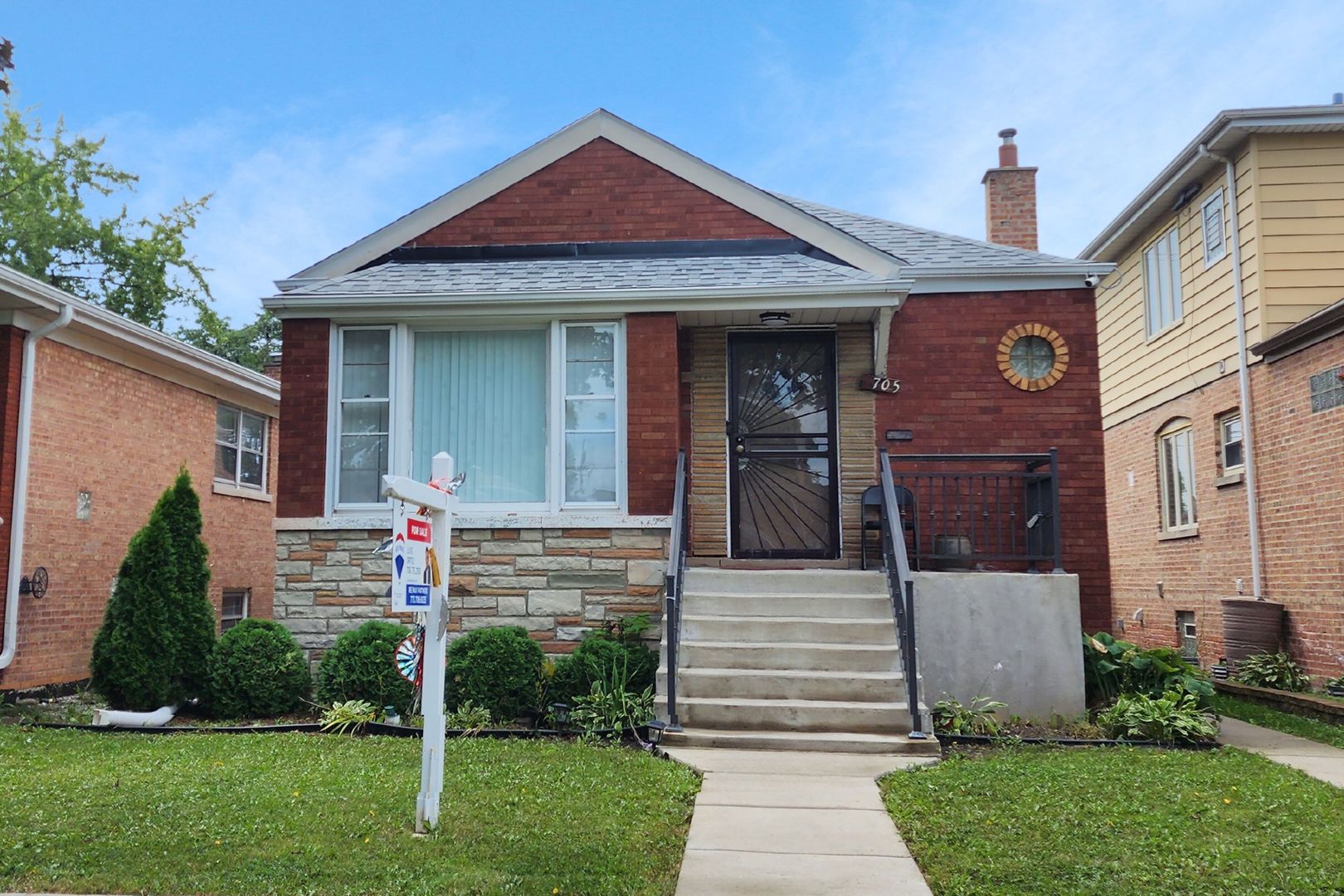 3705 West 65th Place Chicago, IL 60629 - Photo 1 of 31 a front view of a house with garden