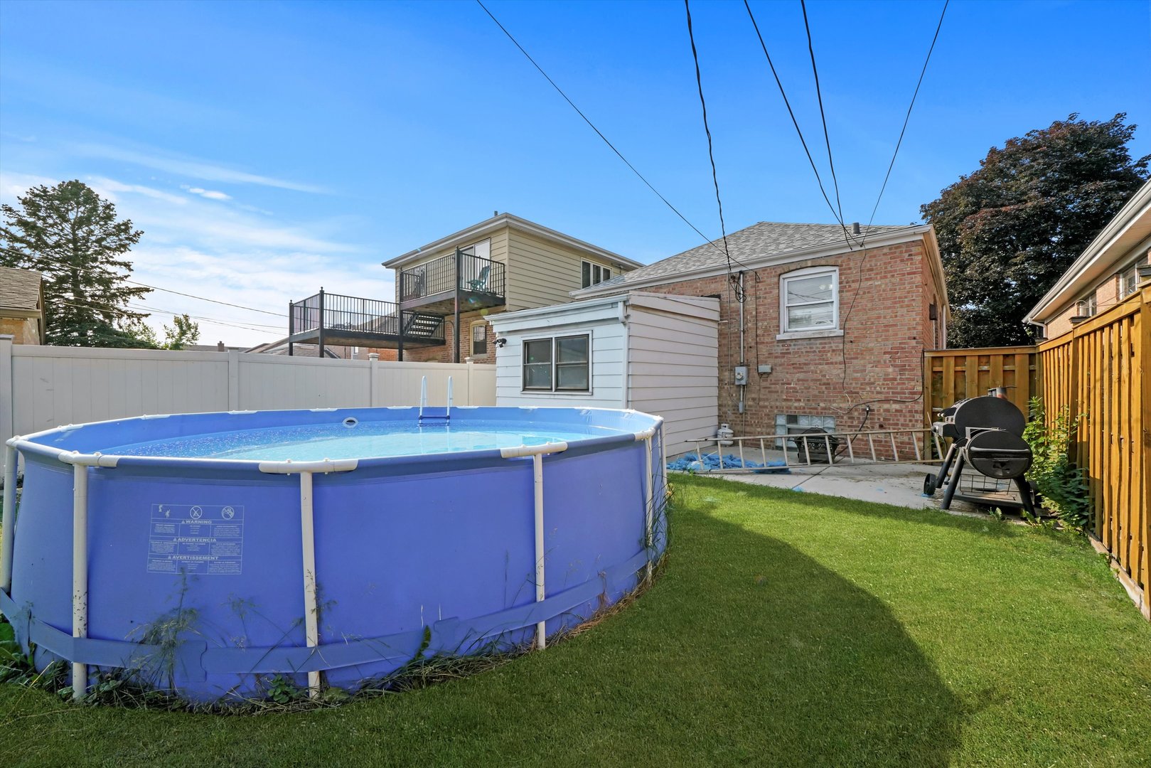 3705 West 65th Place Chicago, IL 60629 - Photo 20 of 31 a view of a house with a backyard