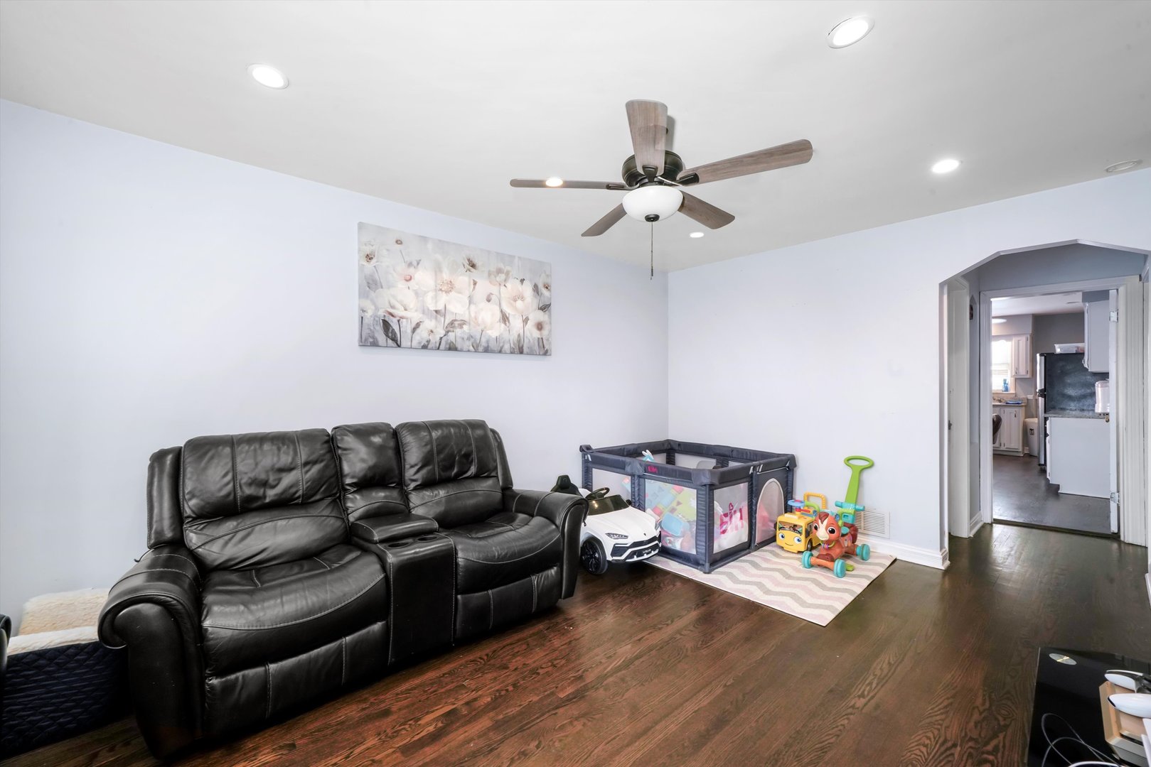 3705 West 65th Place Chicago, IL 60629 - Photo 4 of 31 a living room with furniture and a wooden floor