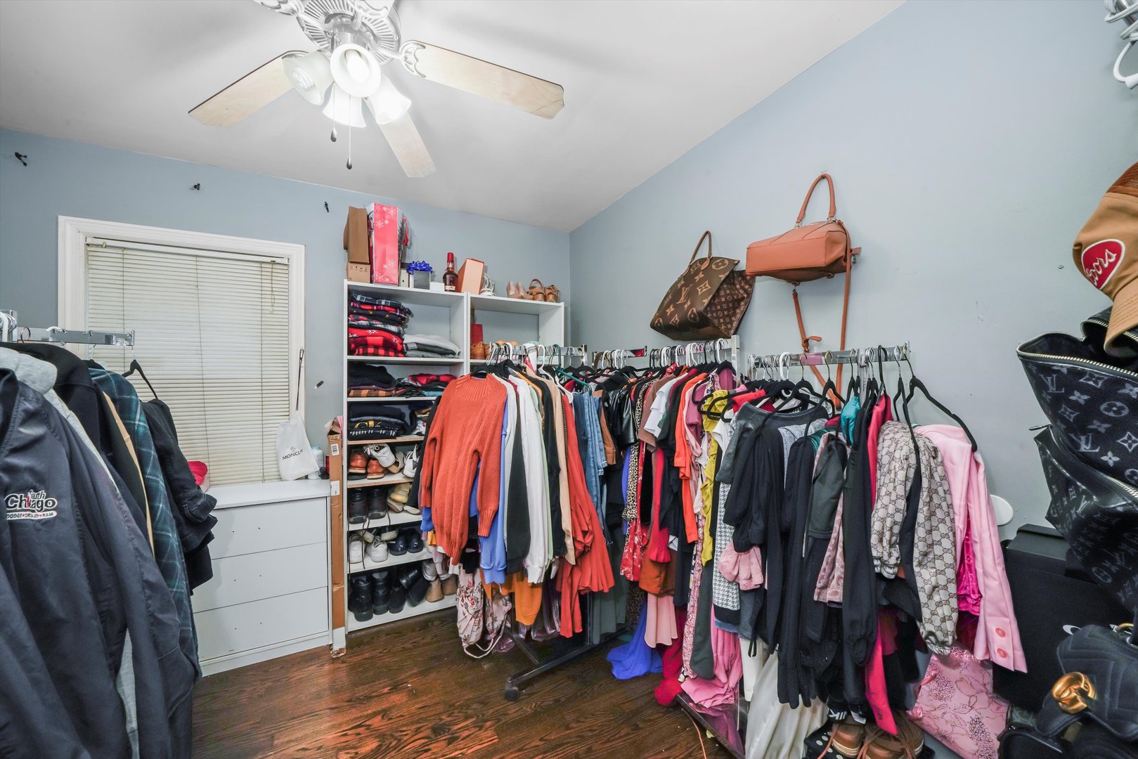 3705 West 65th Place Chicago, IL 60629 - Photo 10 of 31 a view of walk in closet with clothes and shoes