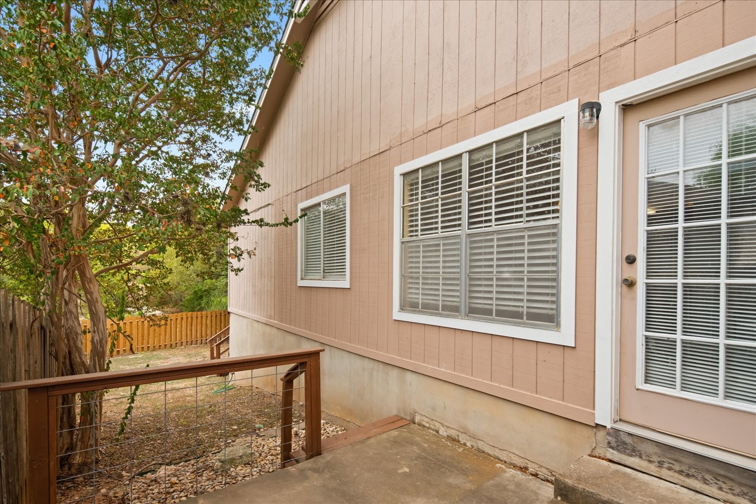 220 Sailmaster Street, Unit A Lakeway, TX 78734 - Photo 26 of 32 a view of a house with a large window