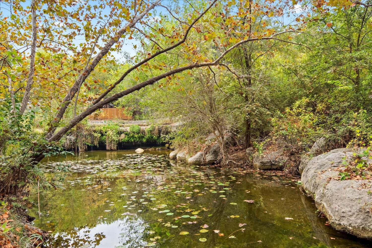 220 Sailmaster Street, Unit A Lakeway, TX 78734 - Photo 5 of 32 a view of a lake with houses
