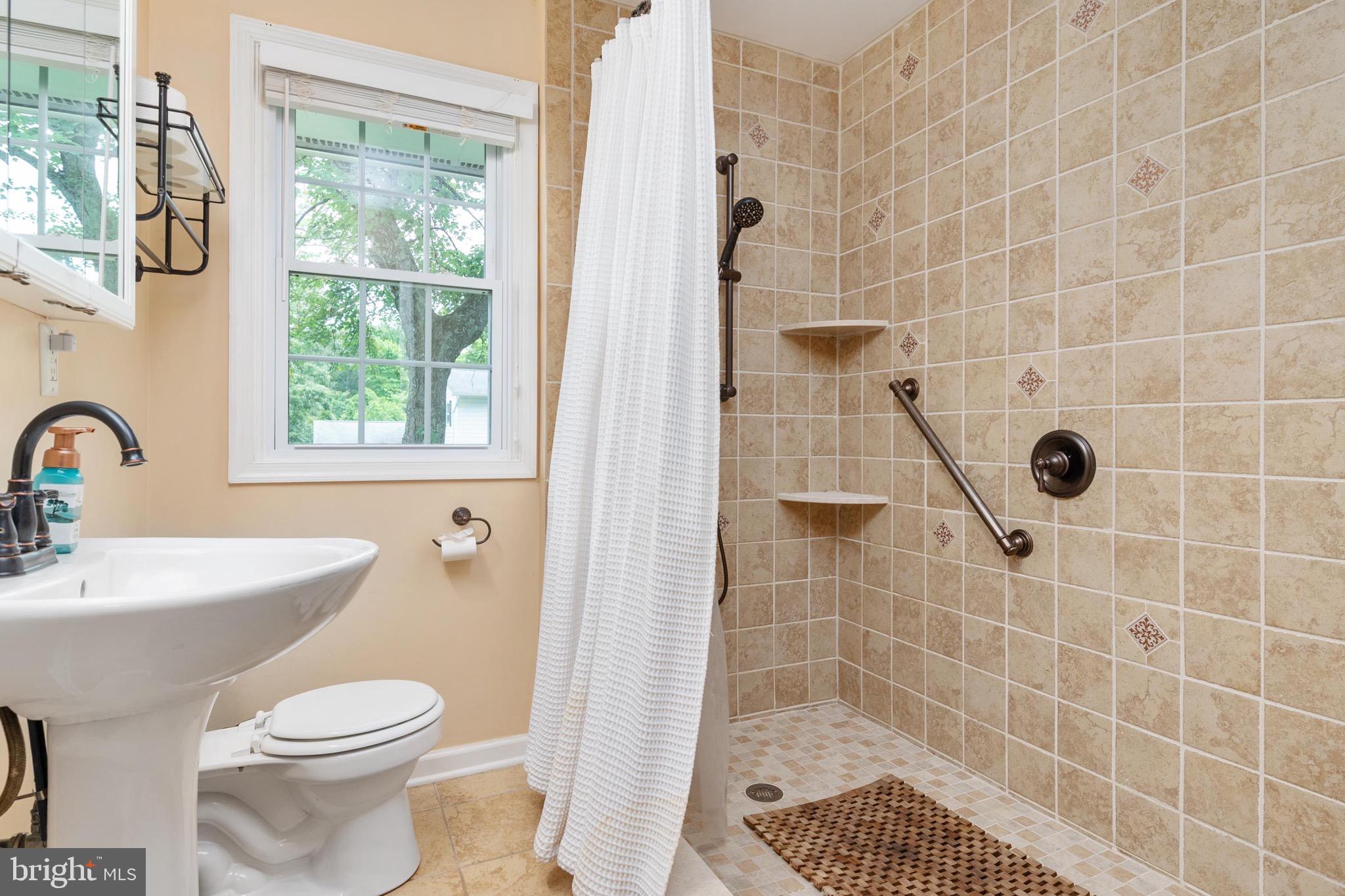 564 Poplar Drive Riva, MD 21140 - Photo 20 of 64 Walk in tiled shower in main level bath