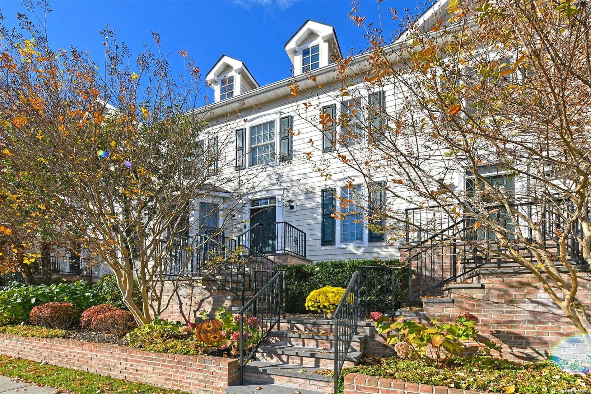 5 Mariners Walk Oyster Bay, NY 11771 - Photo 1 of 1 a front view of a house with a yard