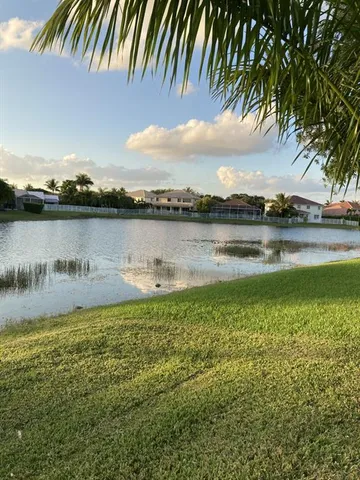 a view of a lake with a city