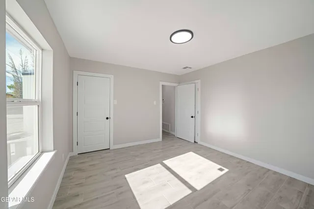 a view of a room with a window