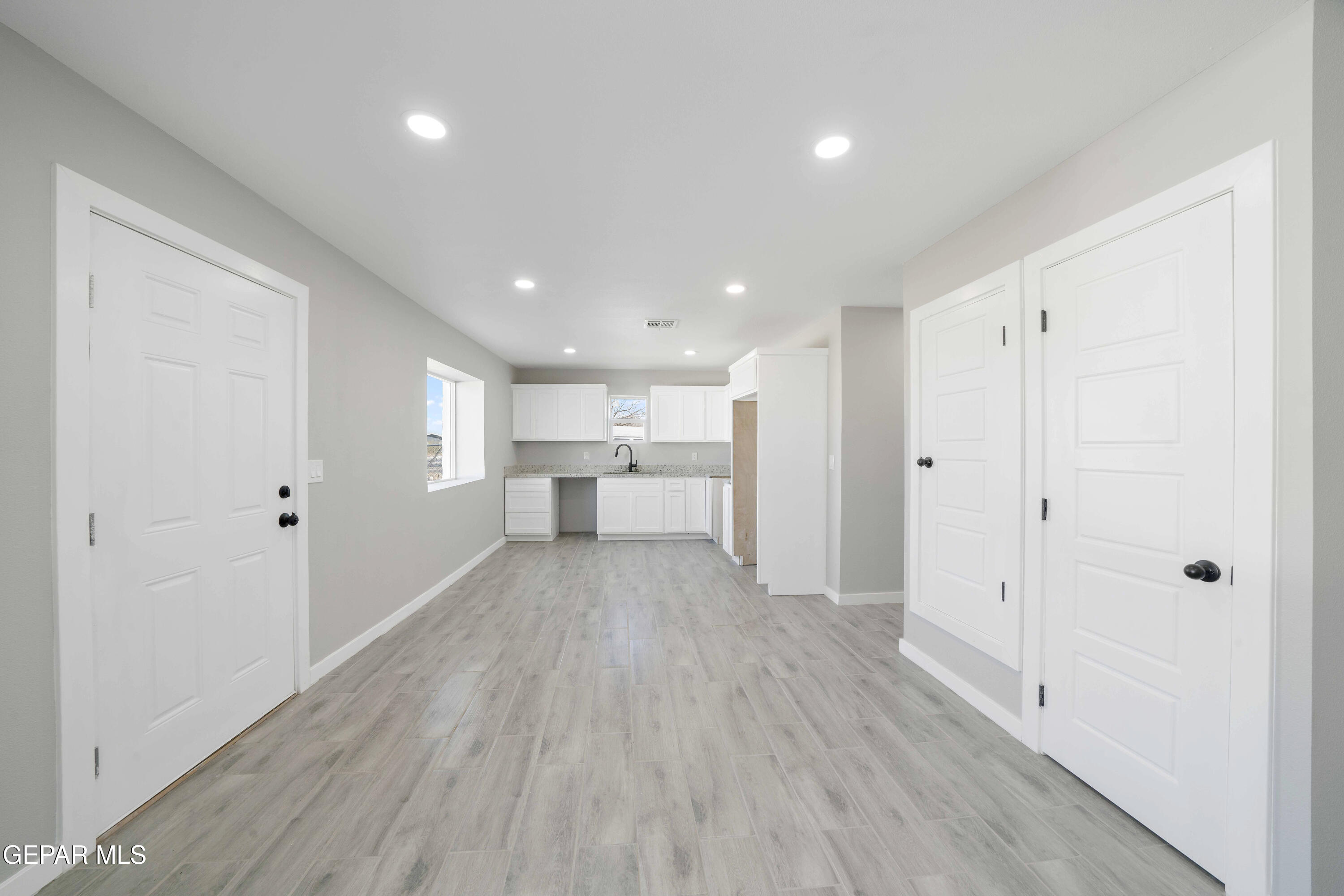 10752 Mellward Road Socorro, TX 79927 - Photo 14 of 37 a view of a kitchen with wooden floor