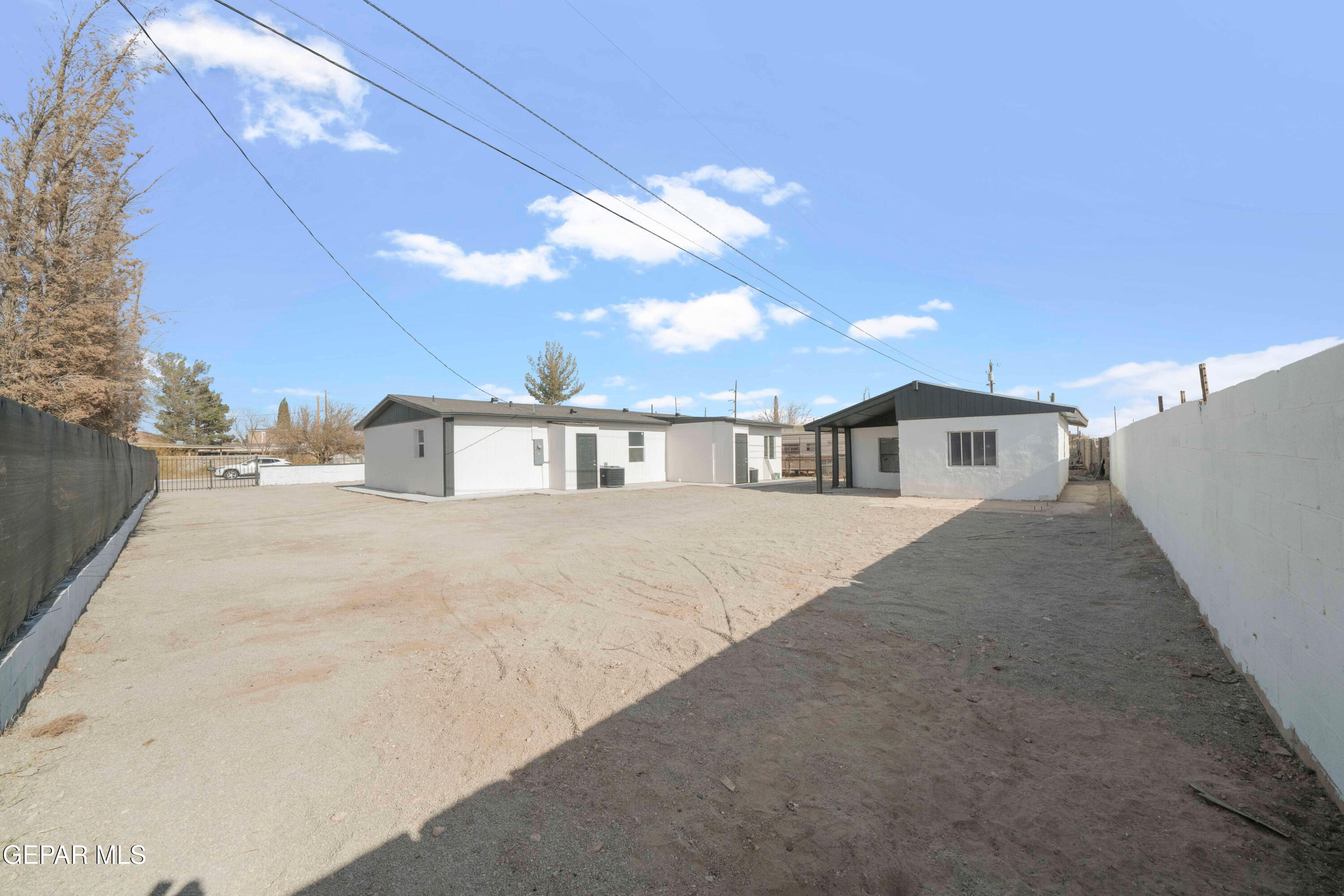 10752 Mellward Road Socorro, TX 79927 - Photo 32 of 37 a front view of a house with a yard