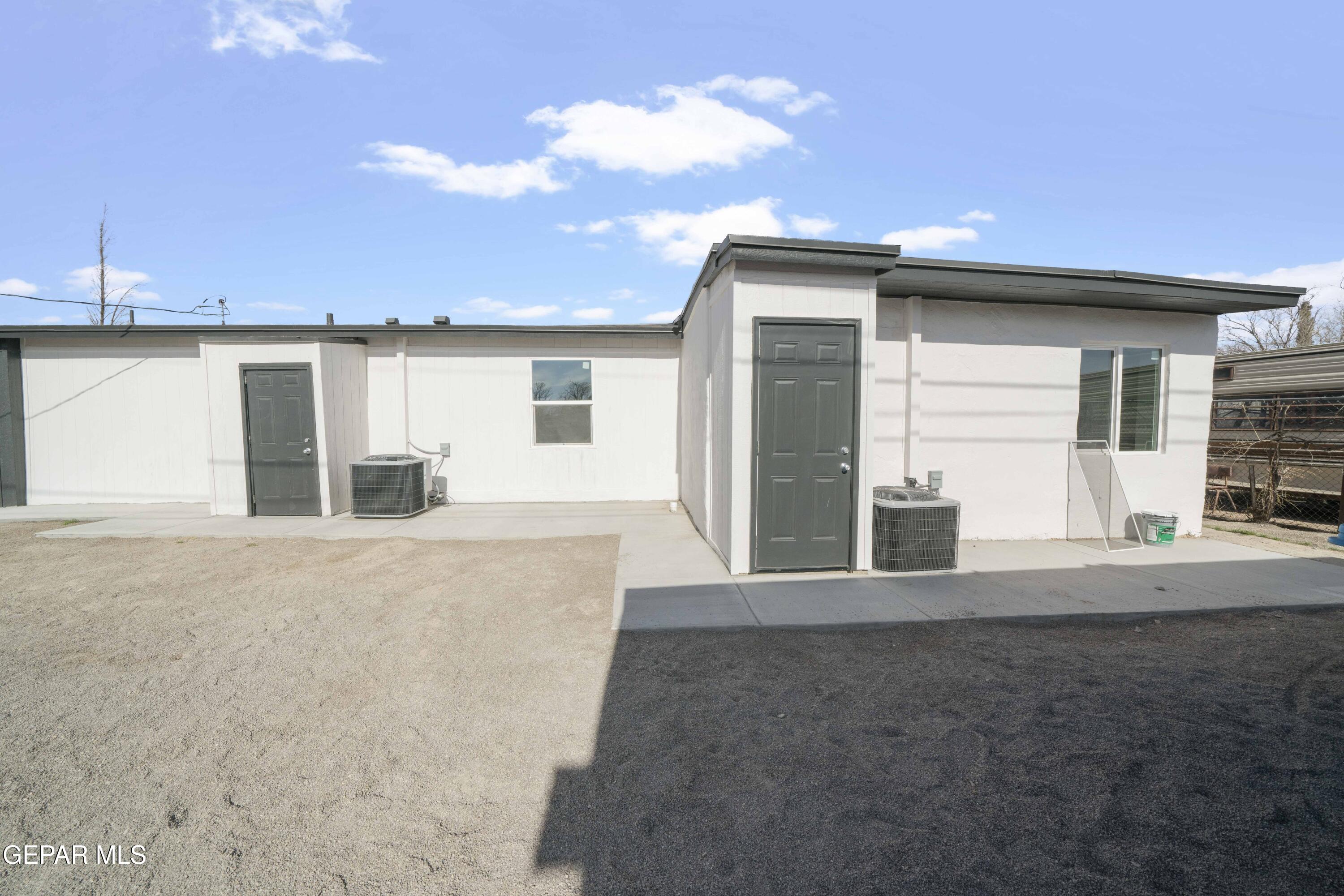 10752 Mellward Road Socorro, TX 79927 - Photo 33 of 37 a view of a house with backyard and a kitchen